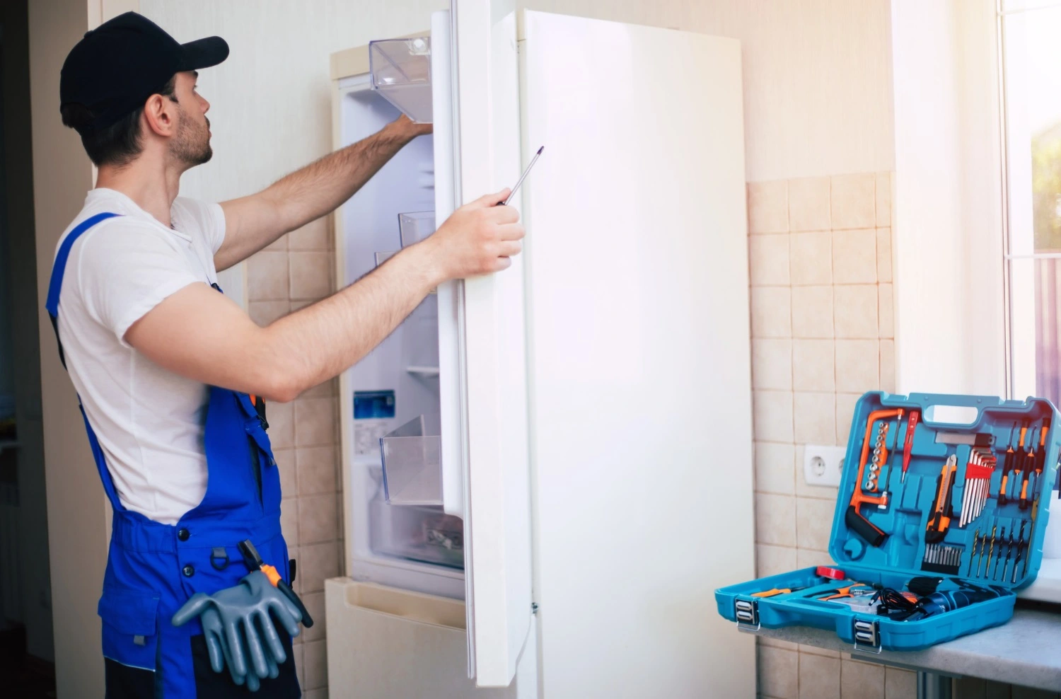 LG refrigerator repair technician fixing cooling system in Los Angeles